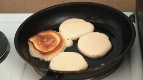 Pancakes fried in a pan 스톡 동영상 64732925