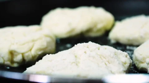 Pancakes fried in a pan Stock Footage 112508695