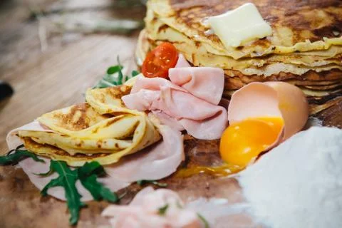 Pancakes with ham cheese and vegetables Foto stock
