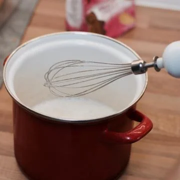 Pancakes in the kitchen Stock Photos