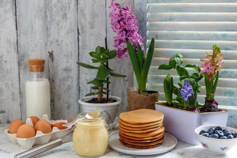 Pancakes on the kitchen table. Breakfast. Stock Photos