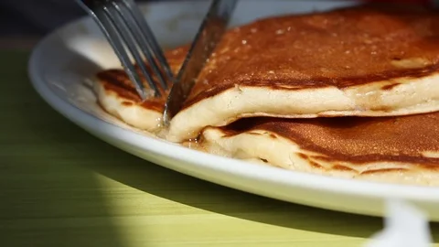 Pancakes knife syrup Stock Footage 123613676