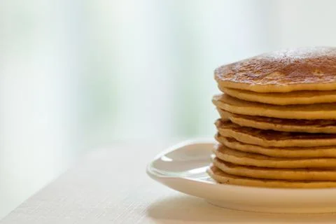 Pancakes on light blurred background Stock Photos