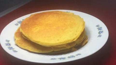 Pancakes with maple syrup Stock Footage 116185664