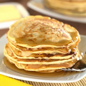Pancakes with maple syrup Stock Photos