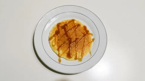 Pancakes with maple syrup Stock Photos
