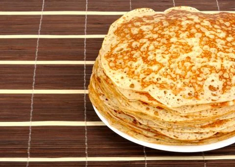 Pancakes on the mat Stock Photos
