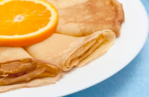 Pancakes with orange Stock Photos