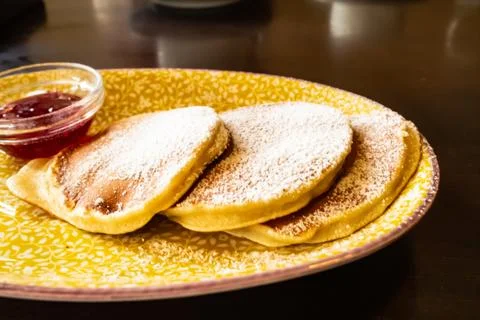 Pancakes on a plate with berry sauce Foto stock