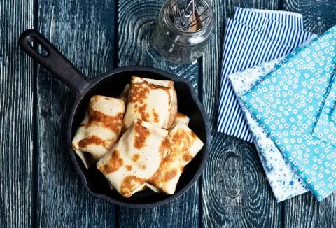 Pancakes on plate on a table Stock Photos