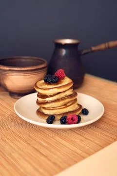 Pancakes with raspberry and coffee Stock Photos