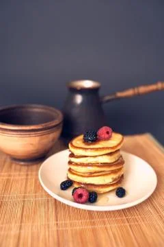 Pancakes with raspberry and coffee Stock Photos