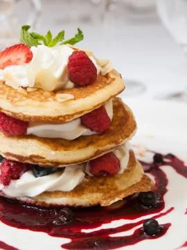 Pancakes with raspberry Stock Photos
