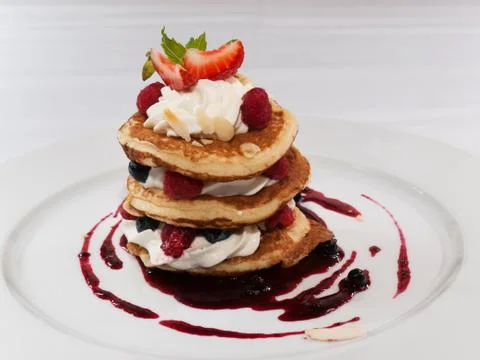 Pancakes with raspberry Stock Photos