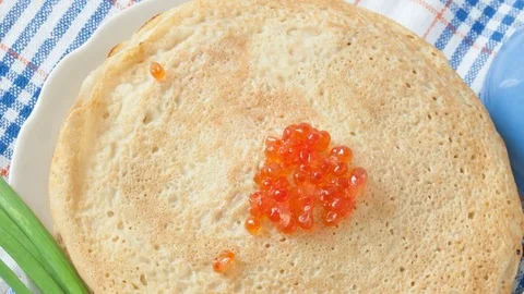 Pancakes with red caviar  Video stock 83610531