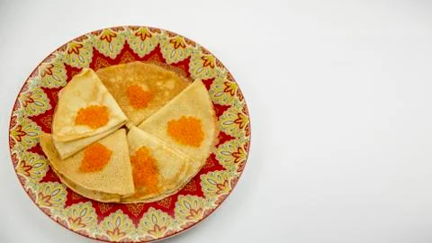 Pancakes with red caviar on a light background with beautiful bokeh Stock Photos