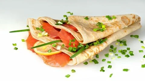 Pancakes with red fish. Stock Photos