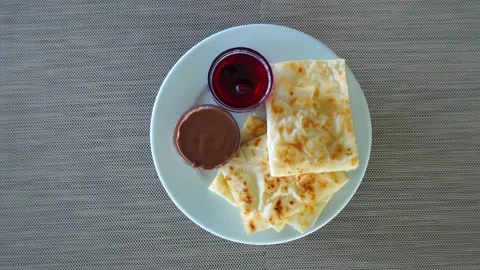 Pancakes on a rotating plate Stock Footage 158330528