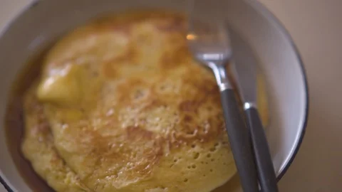 Pancakes served with maple syrup and butter in a plate Stock Footage 87121295