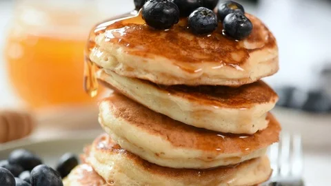 Pancakes stack with blueberry and maple syrup Stock Footage 116611372