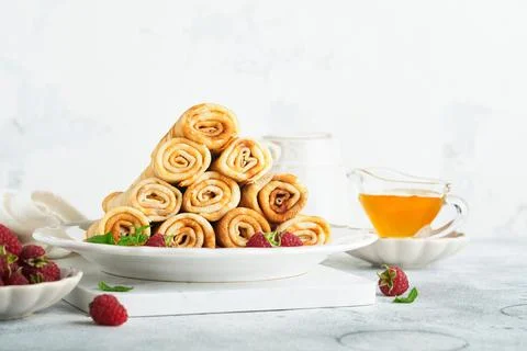 Pancakes. Stack of crepes or thin pancakes with berries, with raspberries and 写真素材