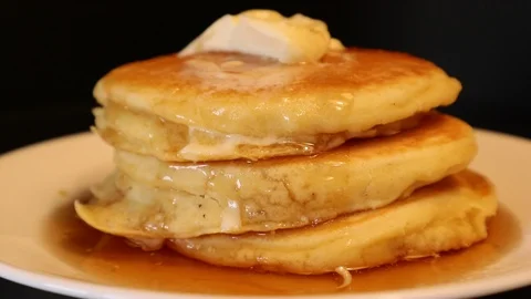 Pancakes in Stack Pouring Maple Syrup Melted Butter Real Time Motion Stock-Footage 127264834