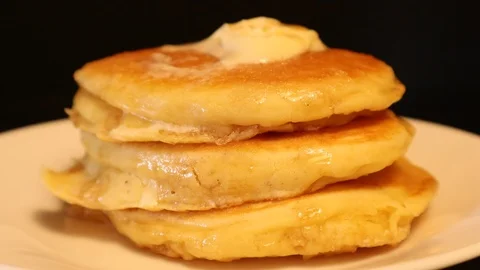 Pancakes in Stack Pouring Maple Syrup Melted Butter Real Time Motion Stock-Footage 127264835