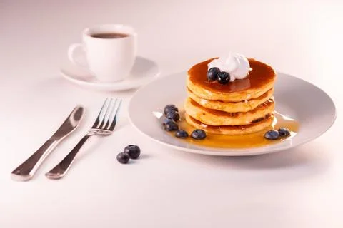 Pancakes stack on white plate. Pancake day Stock Photos