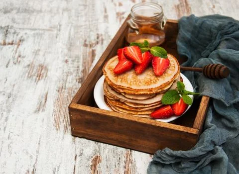 Pancakes with strawberries Stock Photos