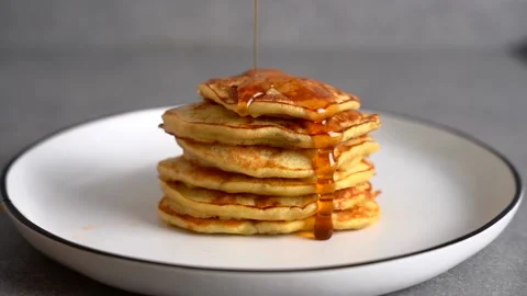 Pancakes with syrup and nuts Stock Footage 168739268