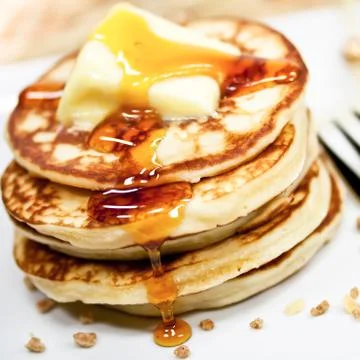 Pancakes with syrup Stock Photos