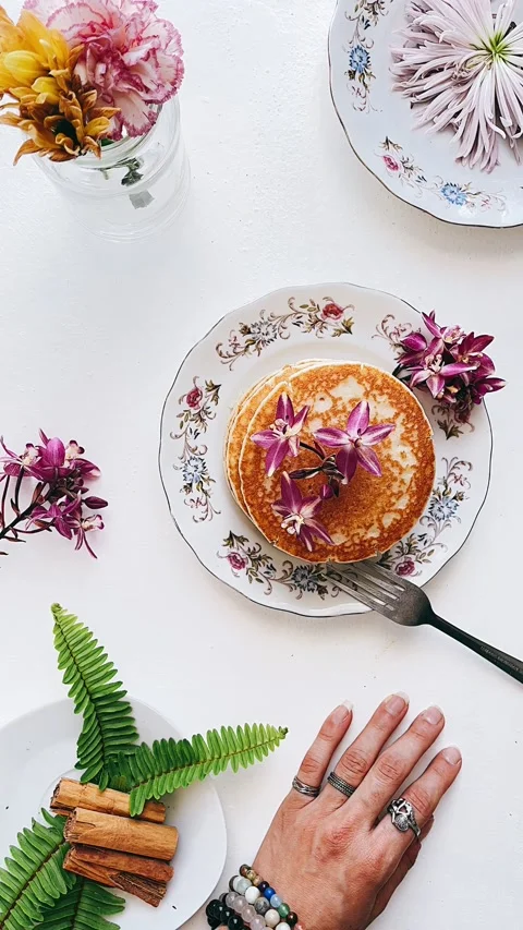 Pancakes On a table, Stack of pancakes paired with Plants Stock Footage 227405271