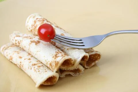 Pancakes with a tomato Stock Photos