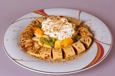 Pancakes with walnuts Stock Photos