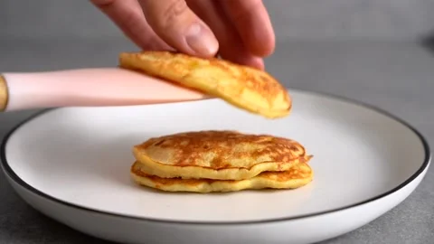 Pancakes on a white plate. Close up. Stock Footage 168736973