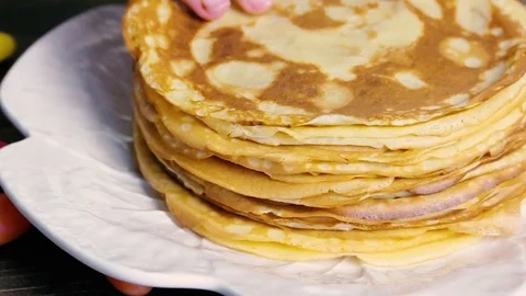 Pancakes on white plate Video stock 84603406