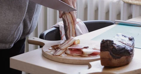 Pancetta cutting, close-up Stock Footage 105855634