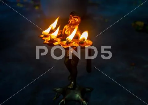 Pancha pradip is used as an offering to God in worship. Stock Photos
