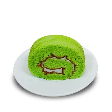 Pandan rolled sponge cake on a plate. isolated white background Stock Photos