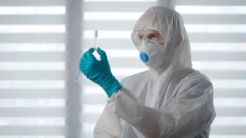 Pandemic Covid-19. When developing a vaccine, we need tests of sick people. Stock Footage 128983717