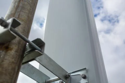 Panel antenna of GSM DCS UMTS LTE bands is as part of communication equipment of Stock Photos