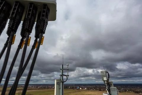 Panel antenna of GSM DCS UMTS LTE bands, GPS antenna and outdoor remote radio Stock Photos