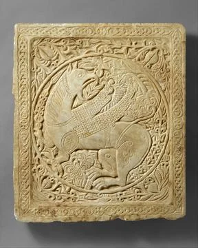 Panel with a Griffin 12501300 Byzantine This commanding image of a griffin .. Stock Photos