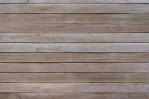 Panel of horizontally stuffed light brown wood planks. Stock-Fotos