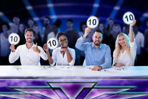 Panel Judges Holding 10 Score Signs Stock Photos