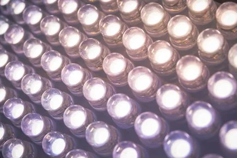 Panel with the LED bulbs close-up texture. Stock Photos