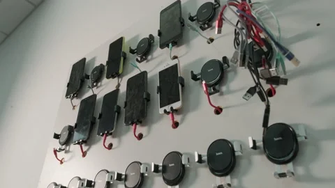 Panel with mobile phones for application testing Stock Footage 170614635