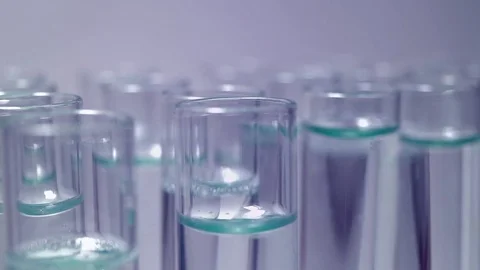 The panel with test tubes close-up. Genetics in yellow gloves makes a test Stock Footage 81600412