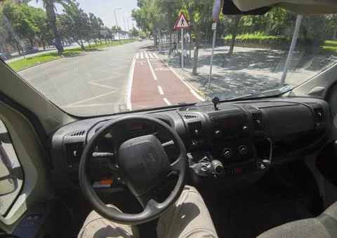 Panel van parked invading the bike lane 库存照片
