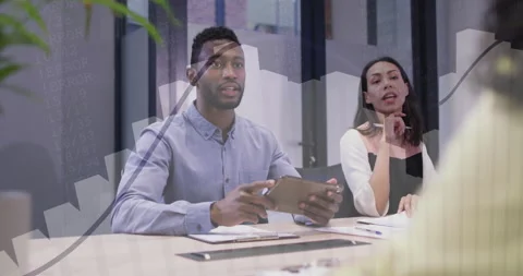 Panelist referencing tablet for evaluating candidate in job interview while Stock Footage 311226600